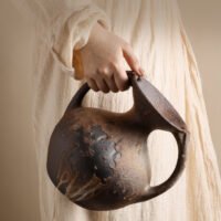 Wabiv dry-glazed earthy ceramic flower vessel with textured natural finish