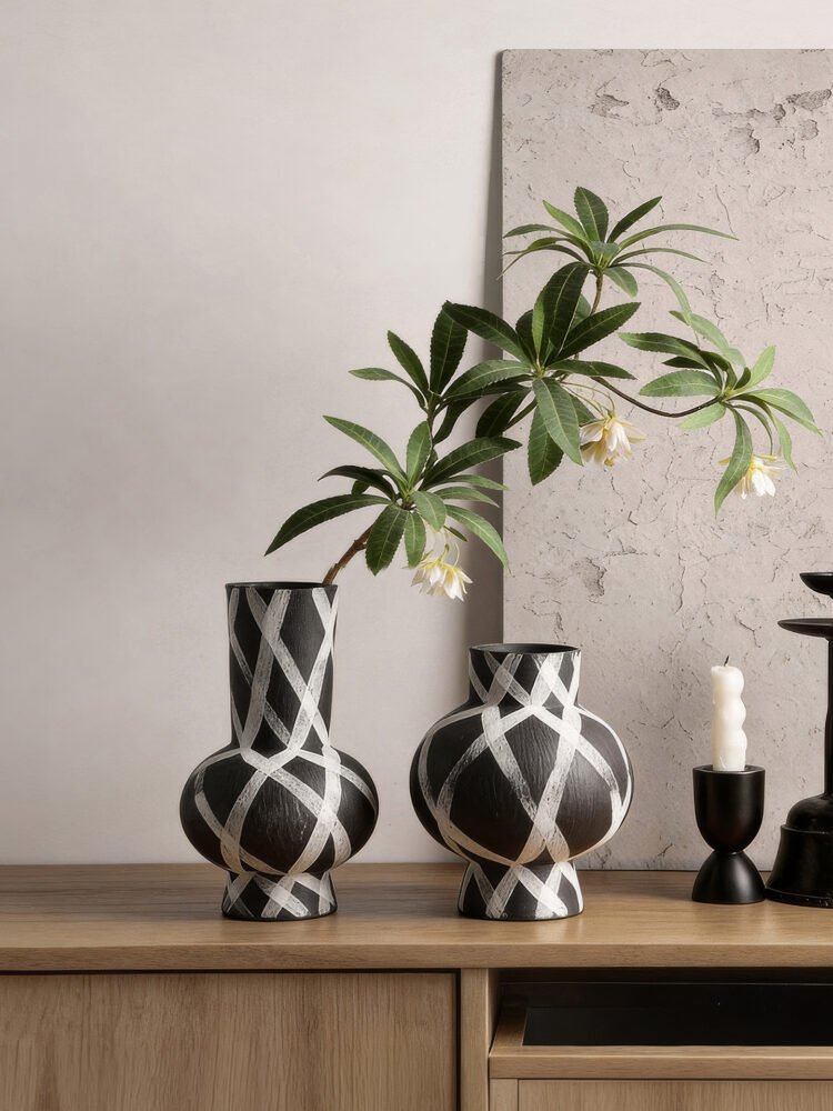 Wabiv modern ink-patterned striped ceramic vase in minimalist studio setting