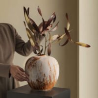 Wabiv rustic unadorned ceramic vessel with weathered traces for wabi-sabi home decor