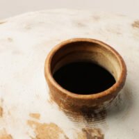 Wabiv rustic unadorned ceramic vessel with weathered traces for wabi-sabi home decor