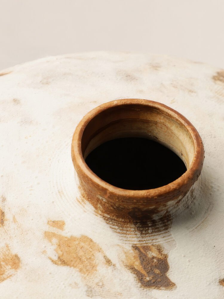Wabiv rustic unadorned ceramic vessel with weathered traces for wabi-sabi home decor