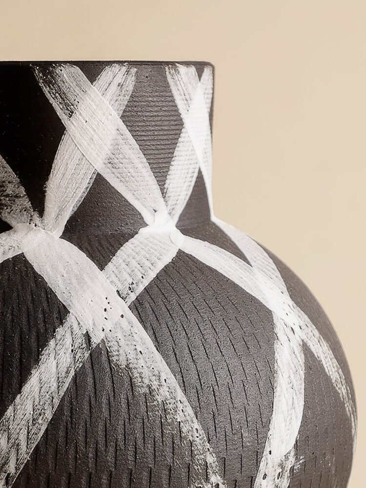 Wabiv modern ink-patterned striped ceramic vase in minimalist studio setting