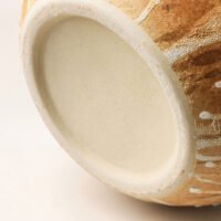 Wabiv rustic unadorned ceramic vessel with weathered traces for wabi-sabi home decor