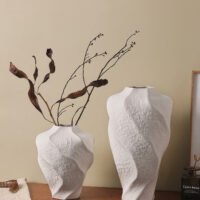 Modern mountain spiral sculptural ceramic art vase in matte obsidian black and marble white