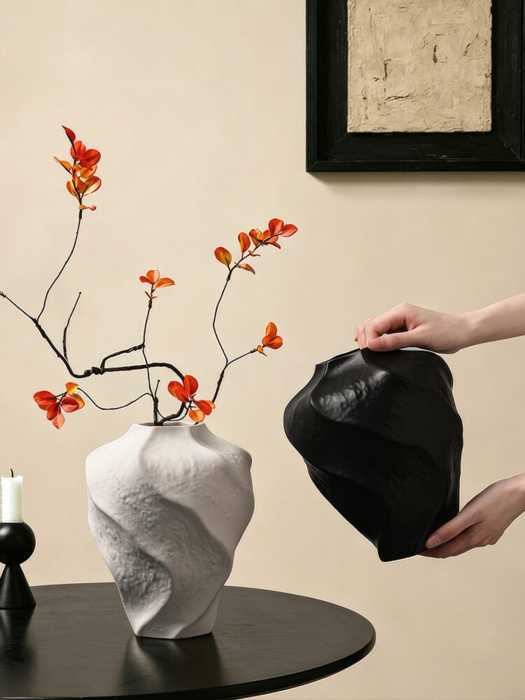 Modern mountain spiral sculptural ceramic art vase in matte obsidian black and marble white