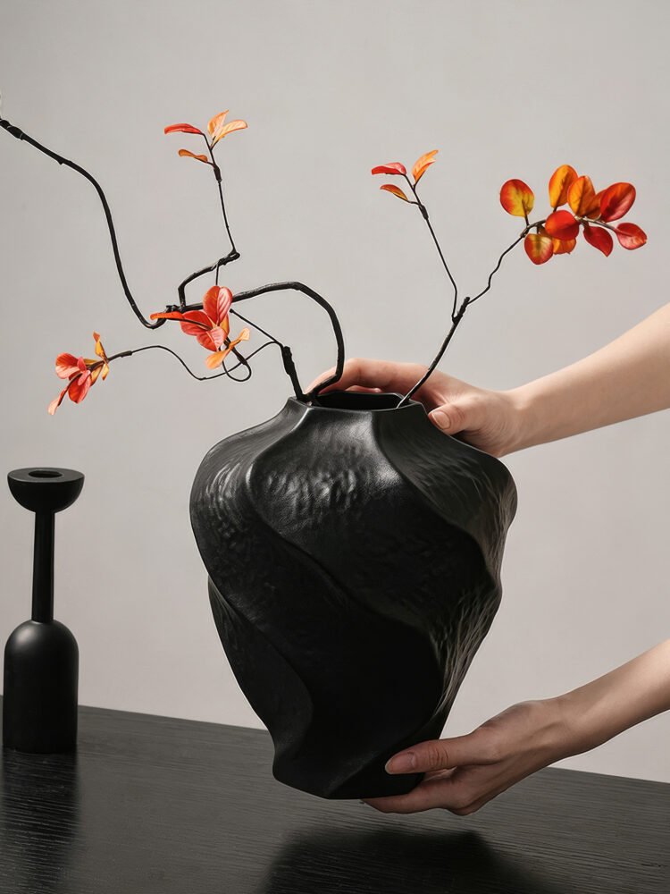 Modern mountain spiral sculptural ceramic art vase in matte obsidian black and marble white