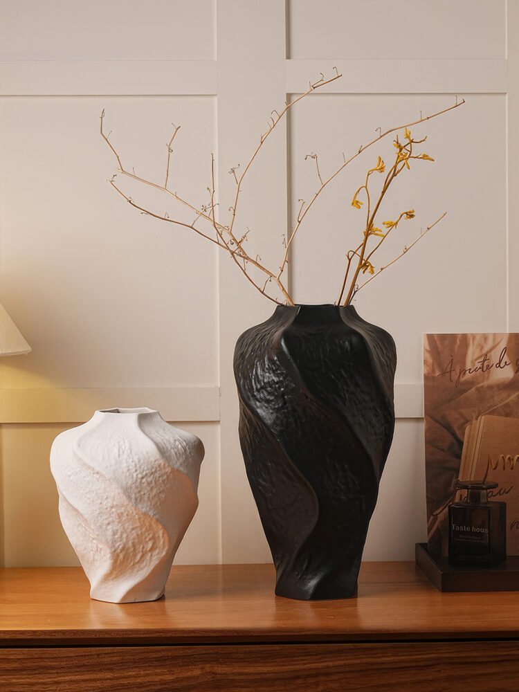 Modern mountain spiral sculptural ceramic art vase in matte obsidian black and marble white